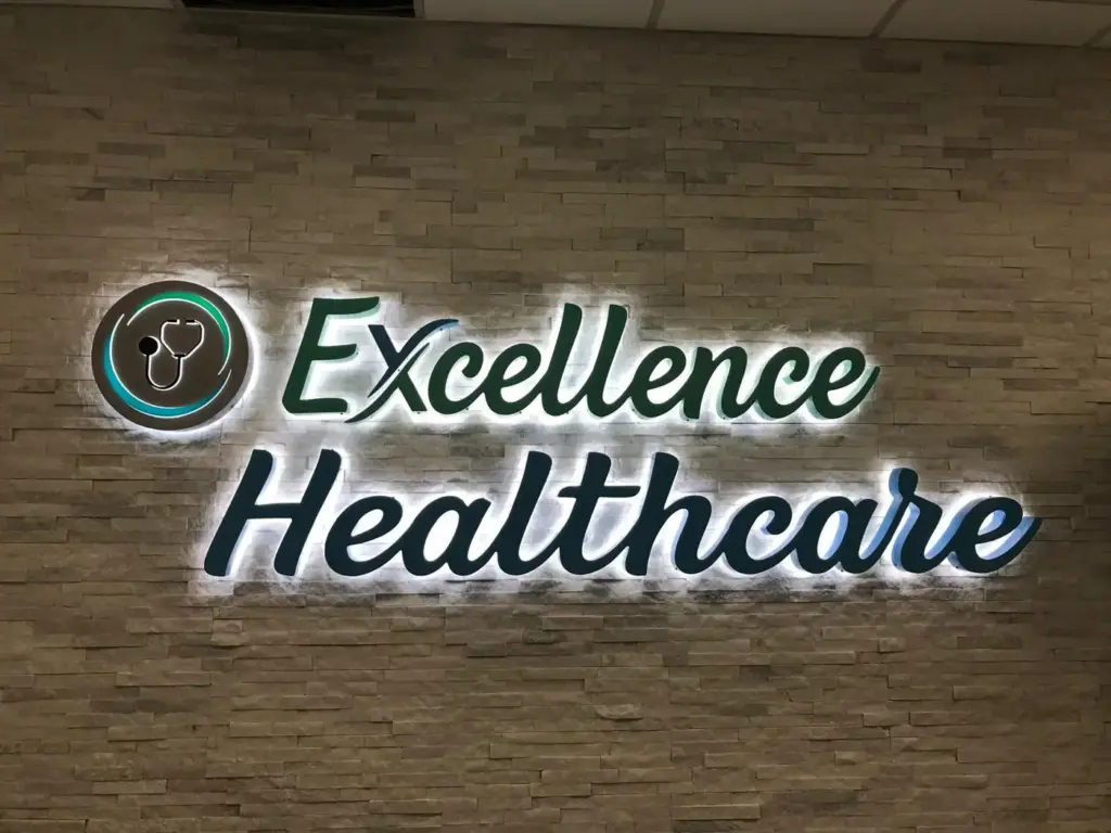 Excellence Healthcare – Interior sign + Channel letters by World Signs USA, Kendall